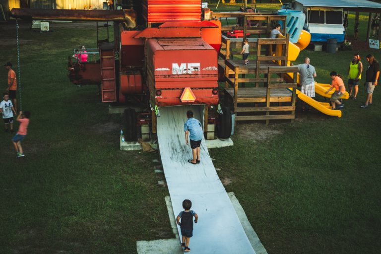 kids playing on Big Frankin-slide at Harvest Holler Corn Maze